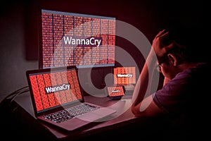 Young Asian male frustrated by WannaCry ransomware attack