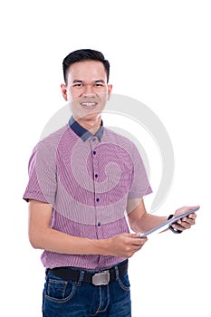 Young asian man in casual shirt using tablet photo