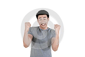 Young Asian man expressing happy on studio