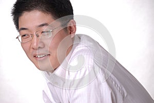 Young Asian man in glasses