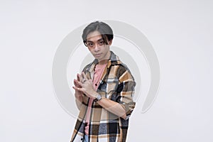 A young asian man making a business proposal. Advocating a plan, soliciting for funding. Isolated on a white background