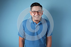 Young Asian Man Smiling Happily