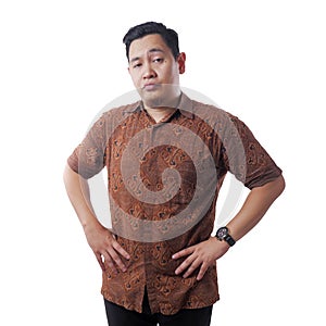 Young Asian Man Wearing Batik Shirt Shows Upset Cynically Annoyed Gesture