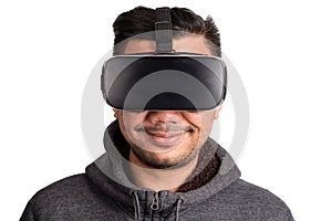 Young asian man wearing virtual reality goggles