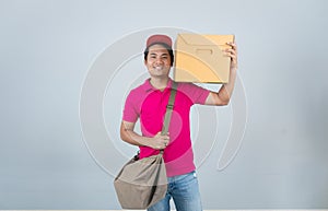 Young Asian Men delivery Services Carrying parcels on the chase and Shoulder Bags with check list paper delivery service concept