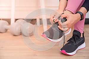 Young Asian muslim woman preparing for workout