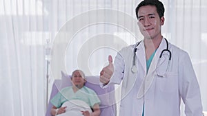 A young Asian physician In the hospital registrar`s office, a portrait of a confident adult doctor smiles confidently and poses