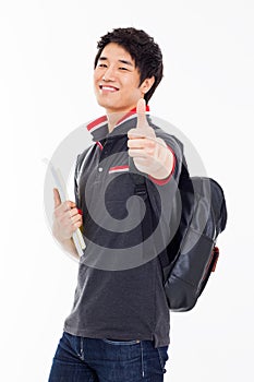 Young Asian student showing thumb