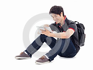 Young Asian student using pad PC