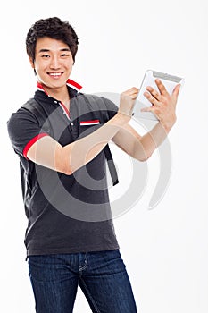 Young Asian student using pad PC