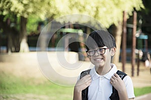 Young Asian Thailand boy happy going to school