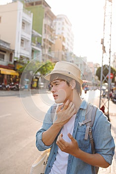 Young Asian traveling backpacker in Cho lon in Chinatown, Saigon