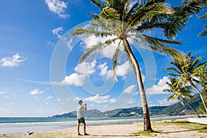 Young Asian traveling at Patong beach, Phuket, Thailand