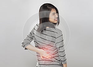 Young asian woman back pain from office syndrome