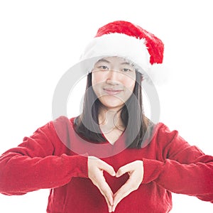 Young asian woman with Christmas hat isolated on white.