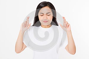 Young asian woman cross fingers for wishing good luck isolated on white background.Template summer t shirt. Copy space