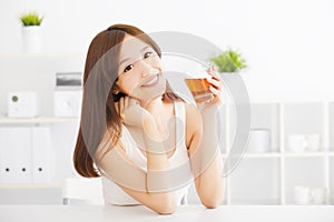 Young asian woman drinking tea