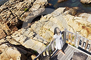 Young asian woman enjoying sunshine