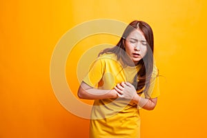 Young Asian woman got chest pain.