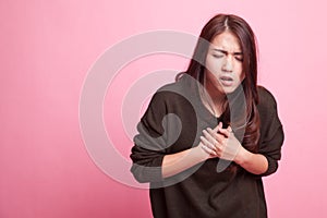 Young Asian woman got chest pain.