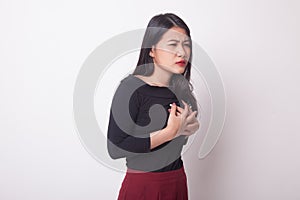 Young Asian woman got chest pain.