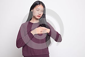 Young Asian woman got chest pain