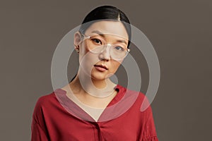 Young Asian Woman on Grey