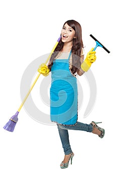 Young asian woman happily doing chores, isolated