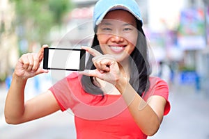 Young asian woman hold smart phone
