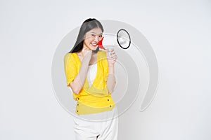 Young Asian woman holding megaphone isolated on white background, Speech and announce concept