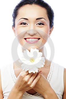 Young asian woman holding white gerber flower