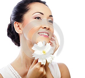 Young asian woman holding white gerber flower