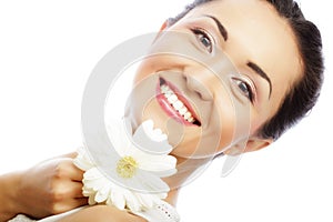 Young asian woman holding white gerber flower