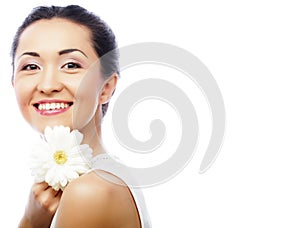 Young asian woman holding white gerber flower