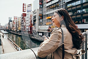 Asian woman lawyer looking around sightseeing