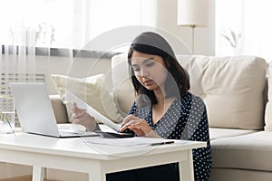 Young asian woman manage budget calculating finances