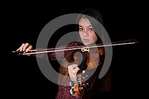 Young asian woman playing violin