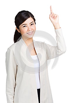 Young Asian woman pointing