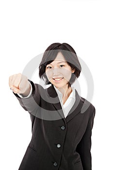 Young asian woman punching