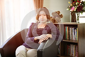Young asian woman short hair relaxation in living room