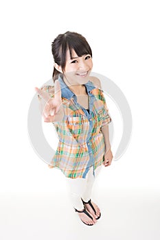 Young asian woman showing the peace or victory hand sign
