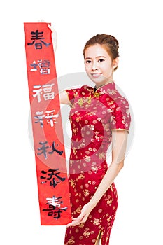 Young asian woman showing Spring festival couplets