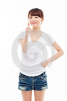 Young Asian woman showing thumb.