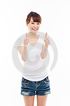 Young Asian woman showing thumb.