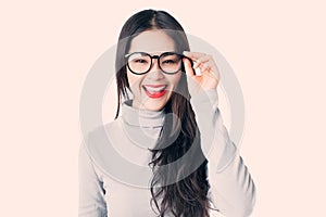 Young Asian woman with smiley face wearing glasses isolated on w