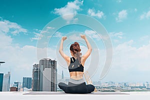 Young asian woman in sport wear doing sports outdoors