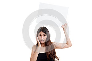 Young Asian woman surprise with white blank sign.