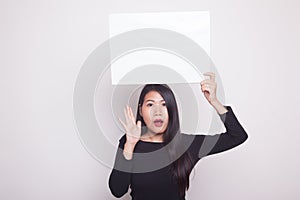 Young Asian woman surprise with white blank sign.
