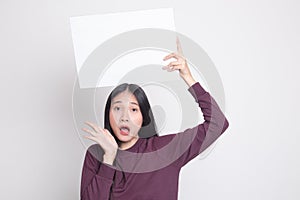 Young Asian woman surprise with white blank sign