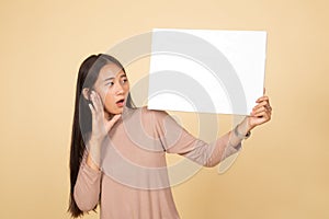 Young Asian woman  surprise with  white blank sign